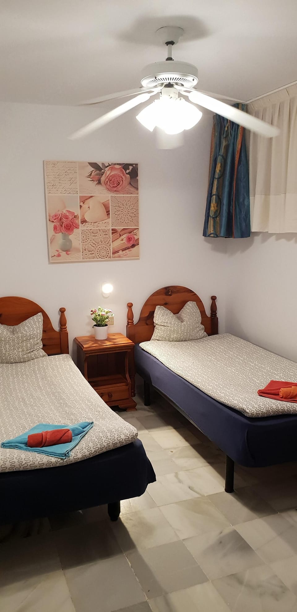 Second bedroom with ceiling fan