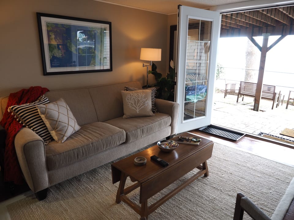 Private Entrance through French Doors that also lead onto the patio and beach. 
