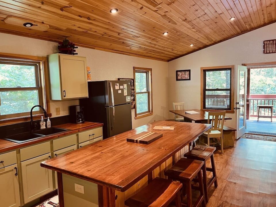 Kitchen and dining area view from entry.