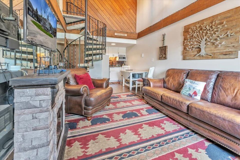 Spiral staircase to second bedroom and loft