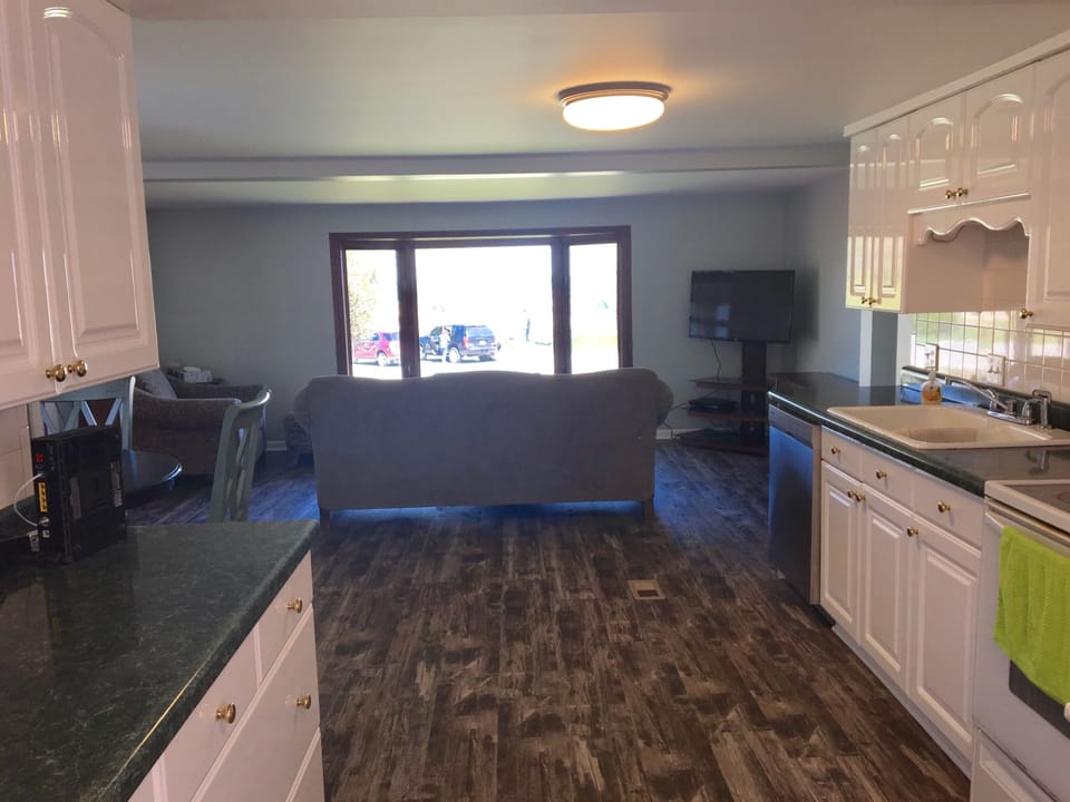 Kitchen leads to the family room with an amazing view
