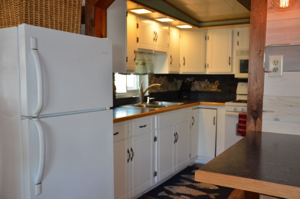 Fully stocked kitchen w/dishwasher. Feel right at home with plenty of storage!!