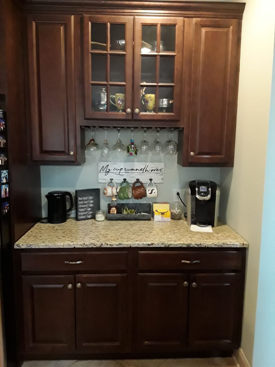 Coffee nook with a drip coffee maker, a Keurig and hot pot. Coffee, tea and coco