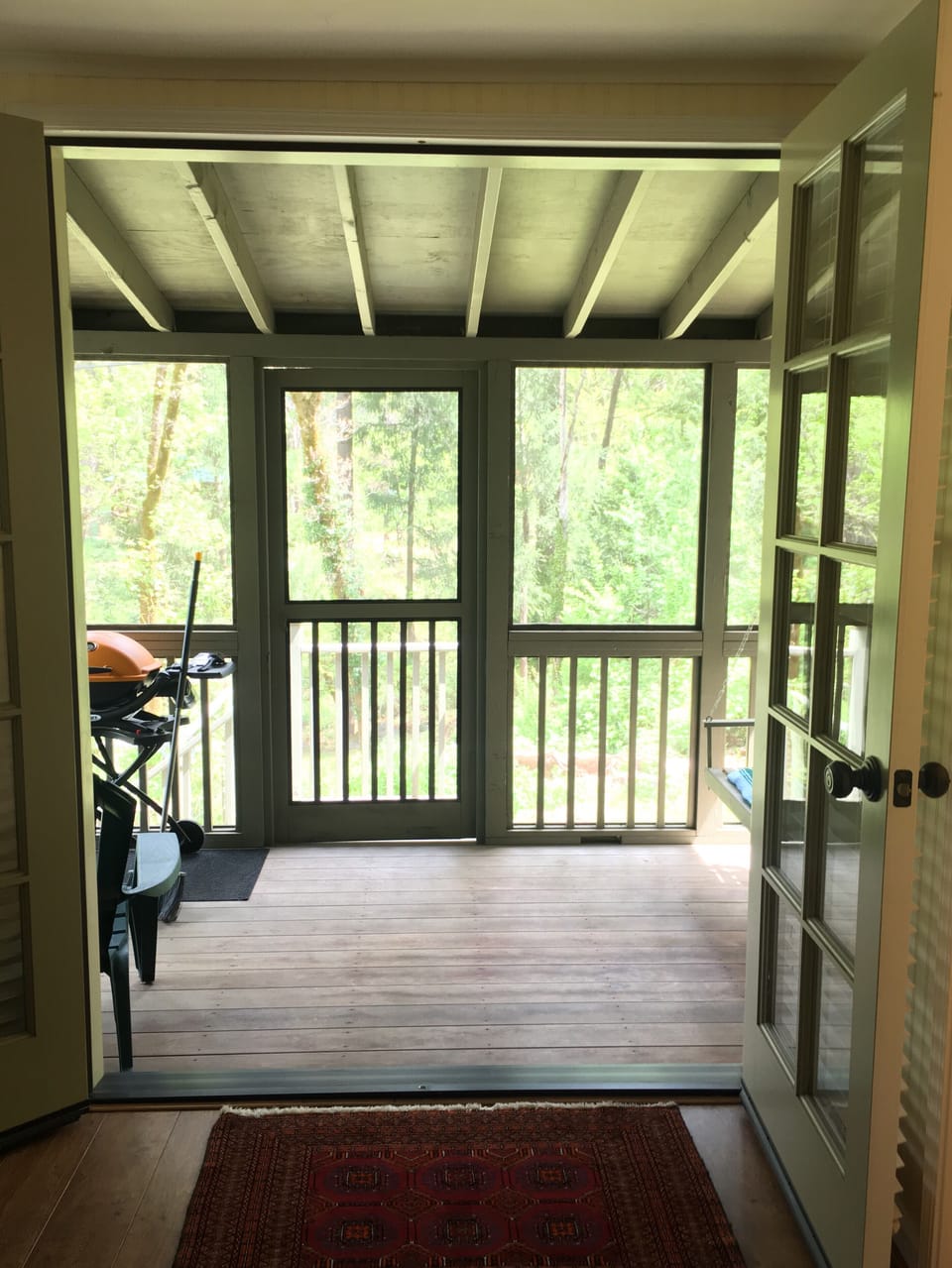 French door open onto the back porch