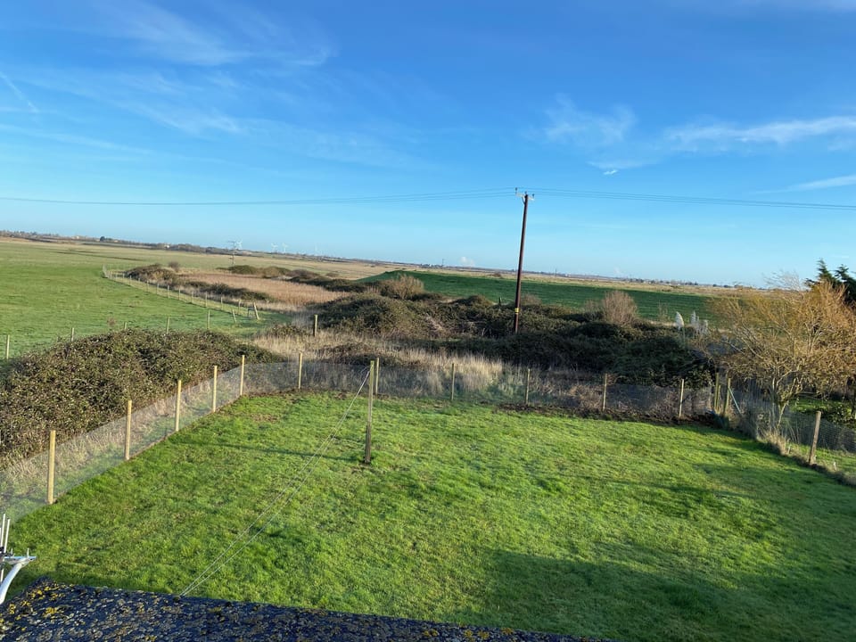 Back bedroom view upstairs shows amazing countryside and fenced in garden 