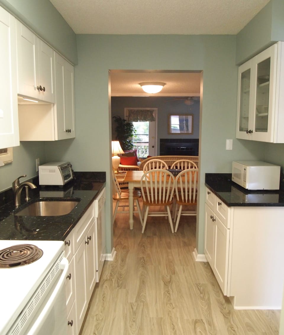 Newly remodeled kitchen has an abundance of cabinet and counter space.