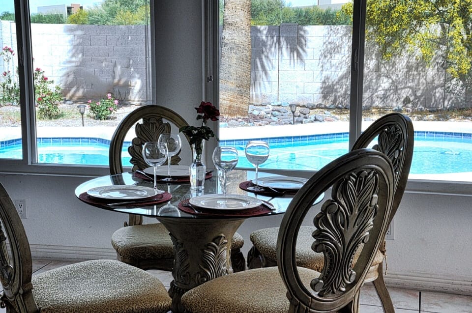 Dining area with pool view.