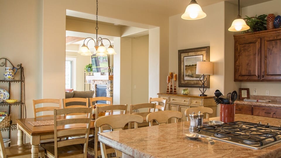 fully stocked gourmet kitchen featuring stainless steel appliances