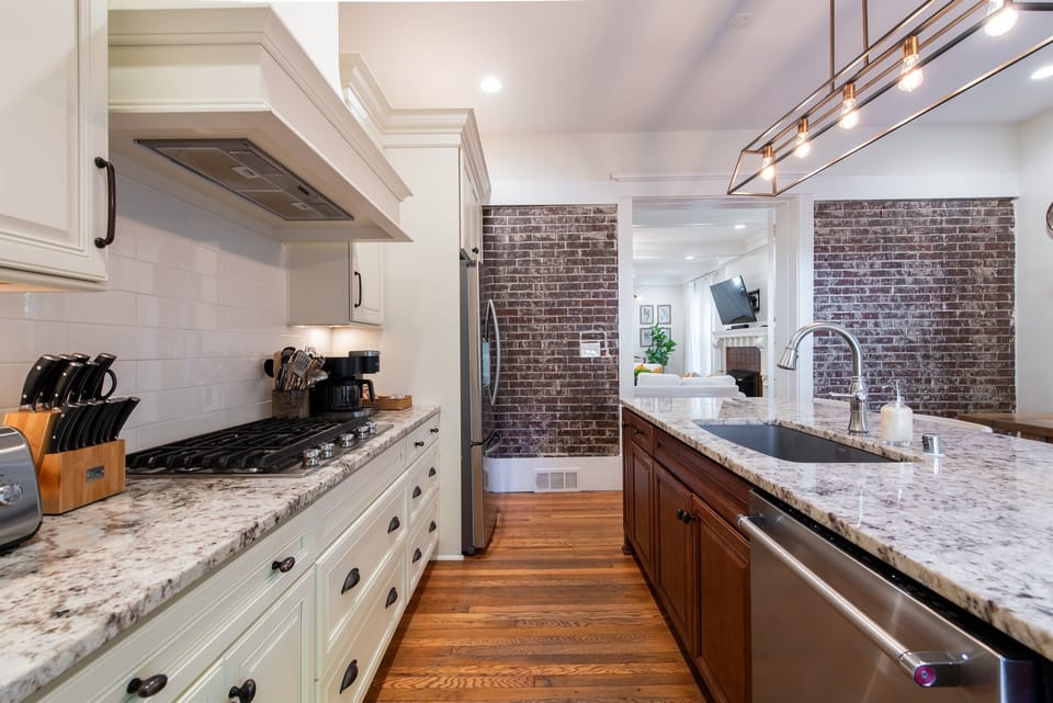 Kitchen #1- Gourmet Kitchen, Seating for 12-16, All Dish Ware, Glass Ware, Pots/Pans, Small Appliances Provided.  Keurig Duo and French Press Coffee Maker Available.