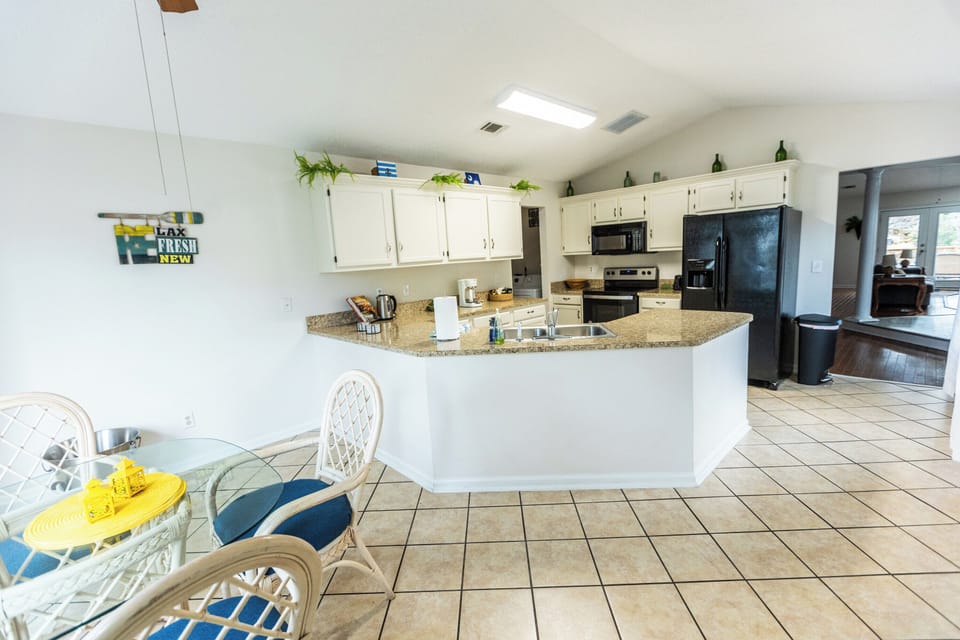 Spacious and open kitchen is stocked to prepare delicious meals