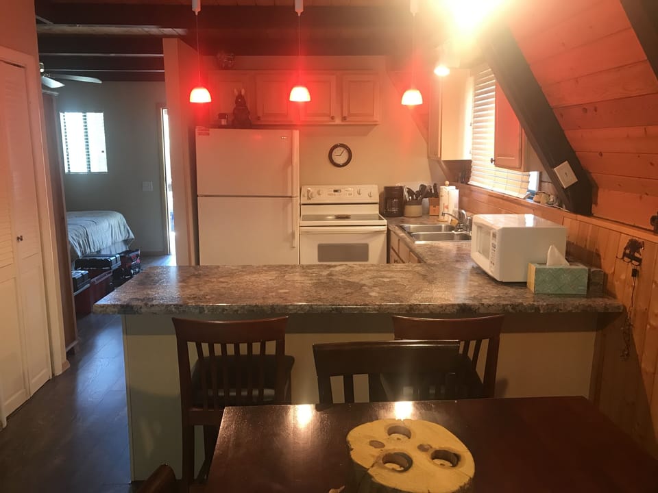 Looking into kitchen from eating area