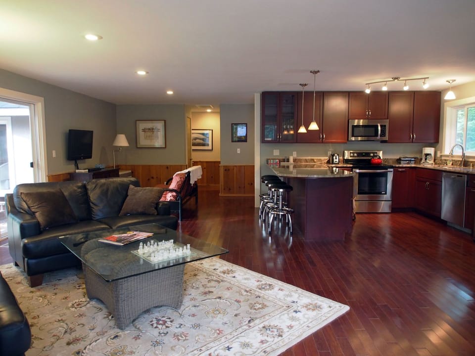 Great room looking from the front entrance - French doors - into the house.