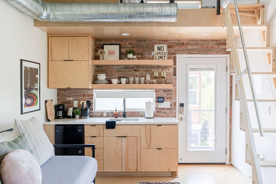 Our hidden microwave keeps the kitchen efficient yet tidy.