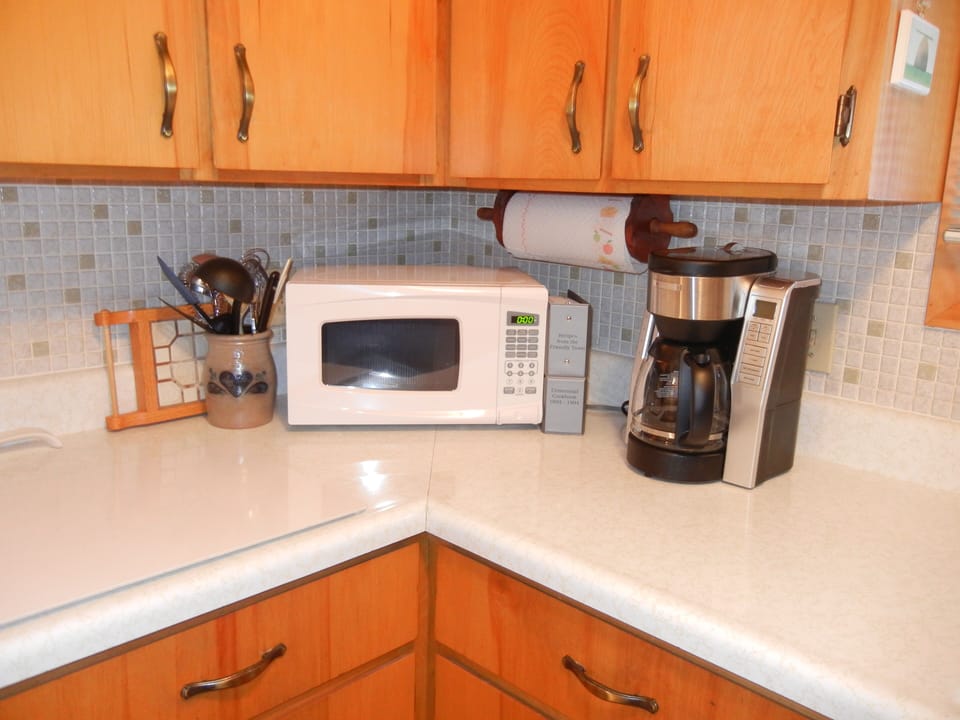 Well equipped kitchen includes full sized appliances, ice maker, dishwasher, etc