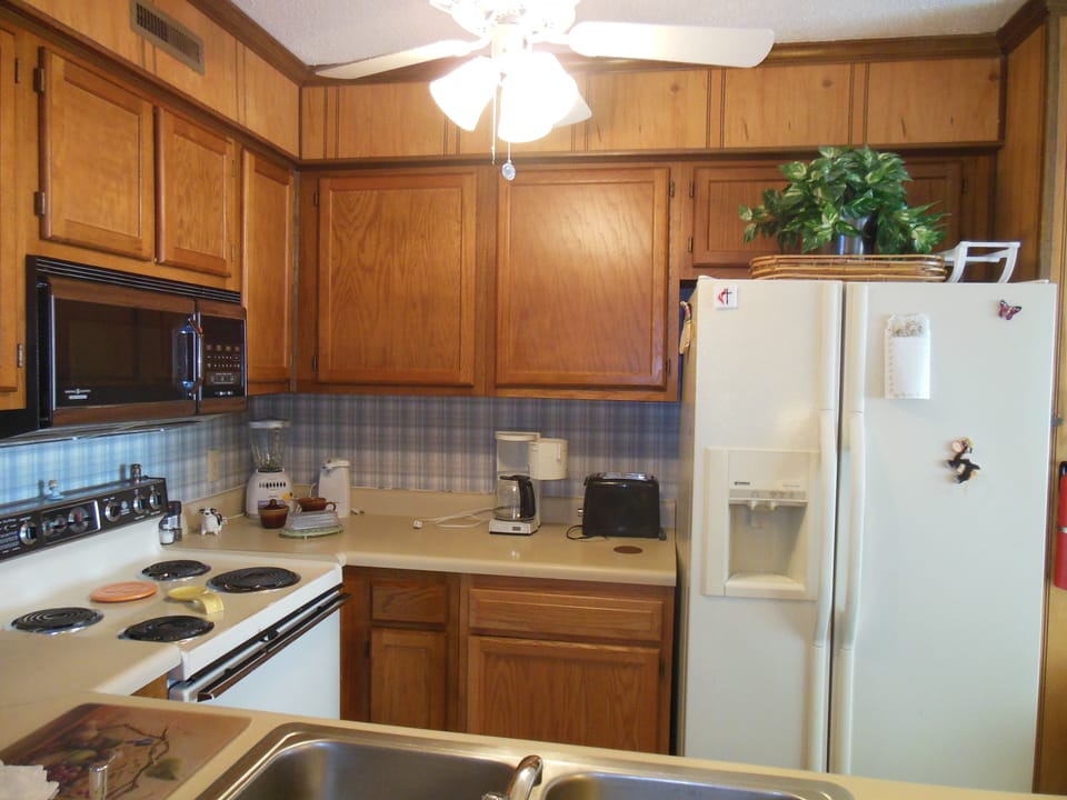 Kitchen  w/all necessary appliances - not shown - new range w/new microwave 

 