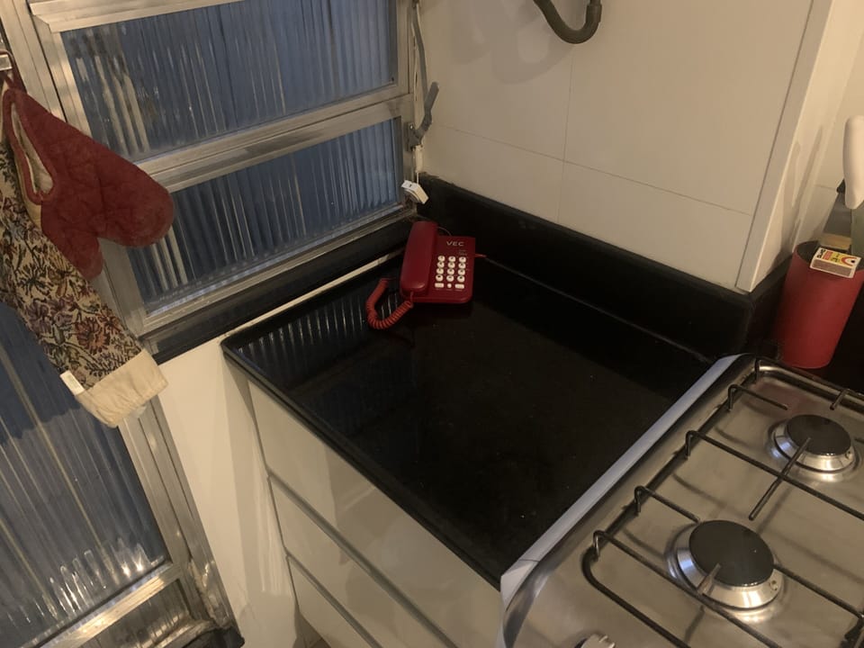 Intercom phone to front door for guest entry and food delivery
