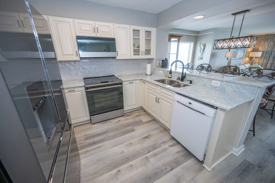New marble counter tops, new sink with new hardware through out condo