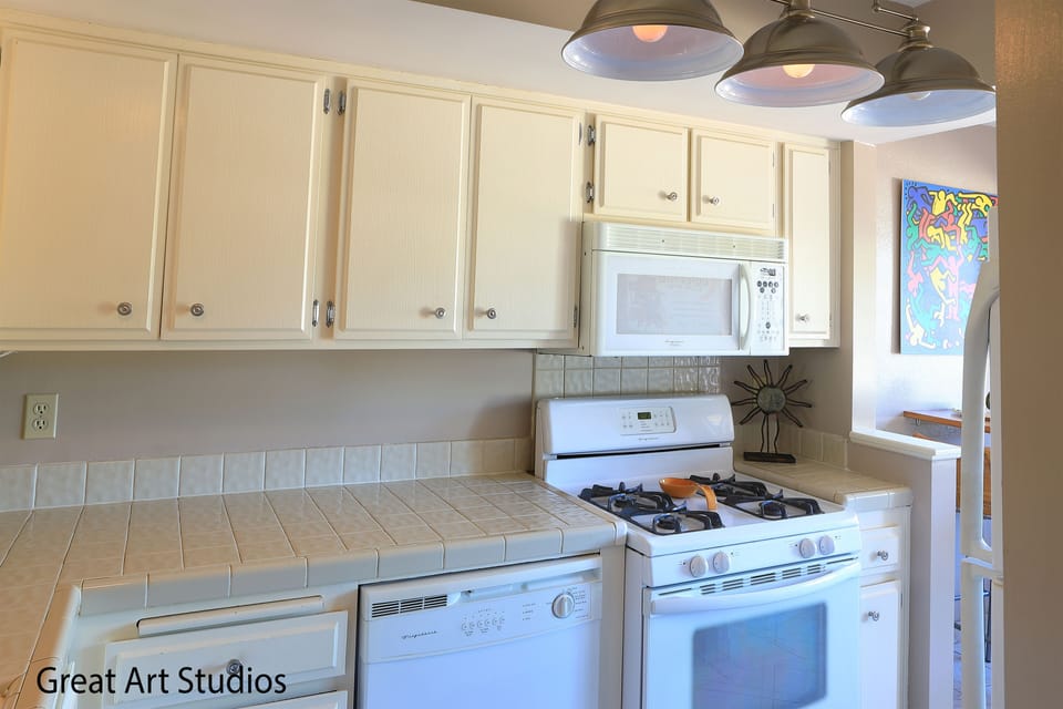 Kitchen w/Stove, Microwave, Dishwasher and Fridge