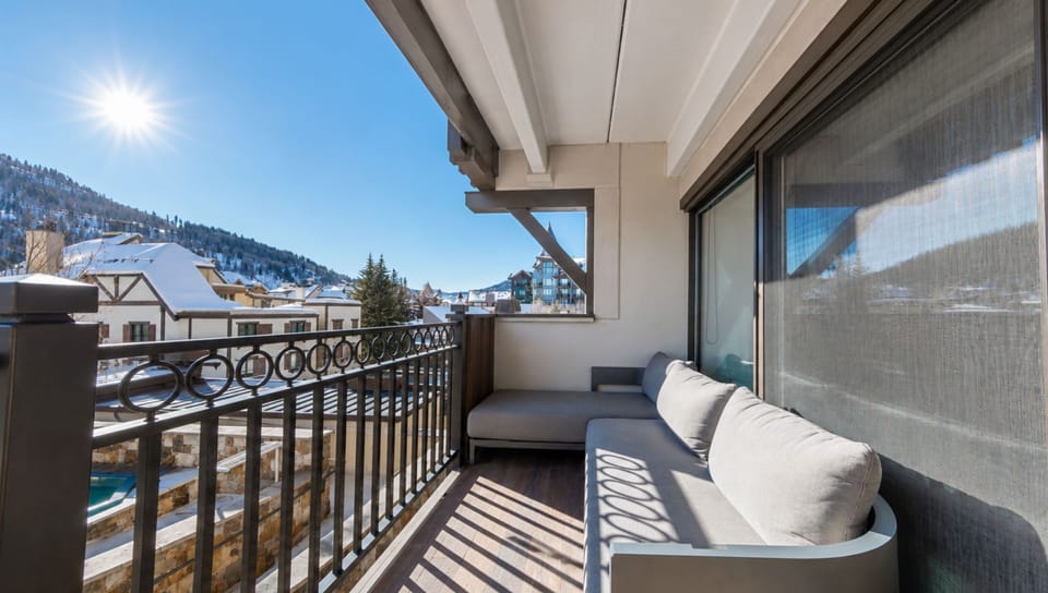 Relax on your private balcony with stunning mountain views, where sunshine and fresh alpine air invite you to unwind in complete comfort.
