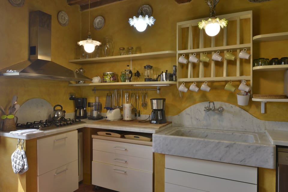 sink in white Carrara marble