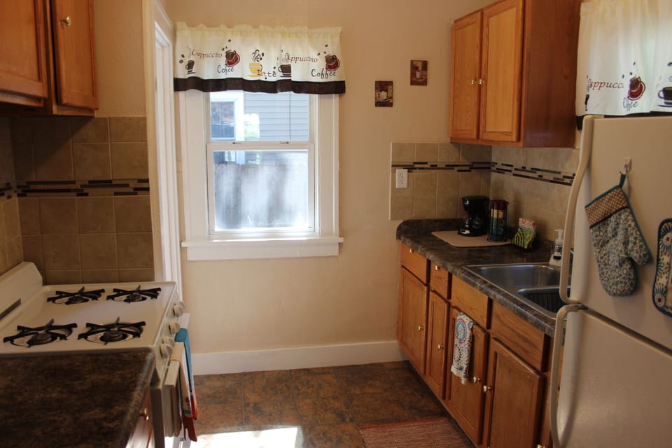 Kitchen has all you need to make and enjoy a basic meal.
