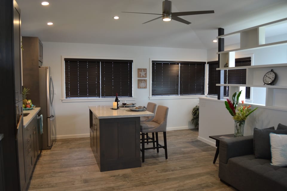 Full size stainless dishwasher & refrigerator, microwave located in the island.