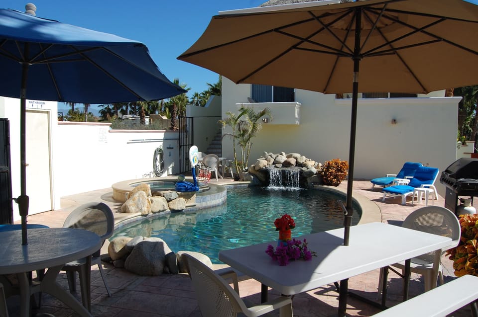 There is a swimming pool, Jacuzzi, and natural rock waterfall!