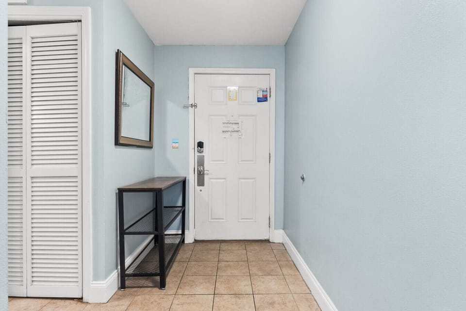 Welcoming foyer with convenient storage and easy access to the rest of the condo.