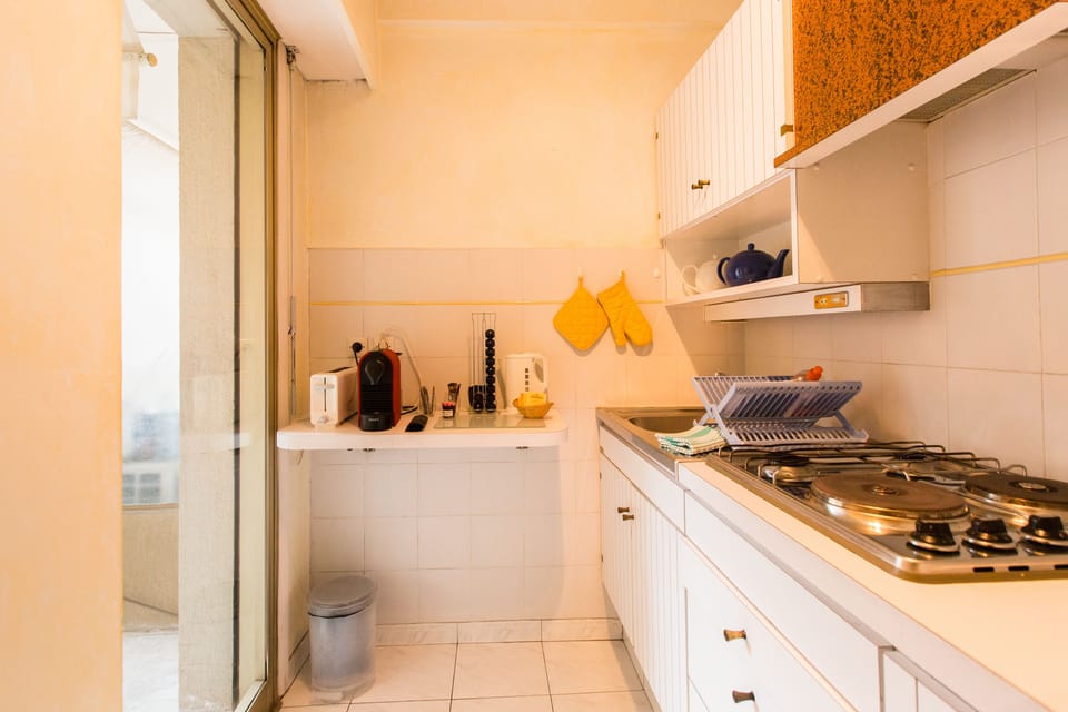kitchen with door to balcony