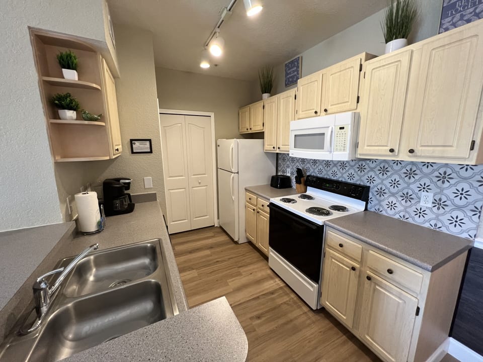 Microwave, Stove, Coffee Maker, Toaster, Pot, Pans and so much more ......