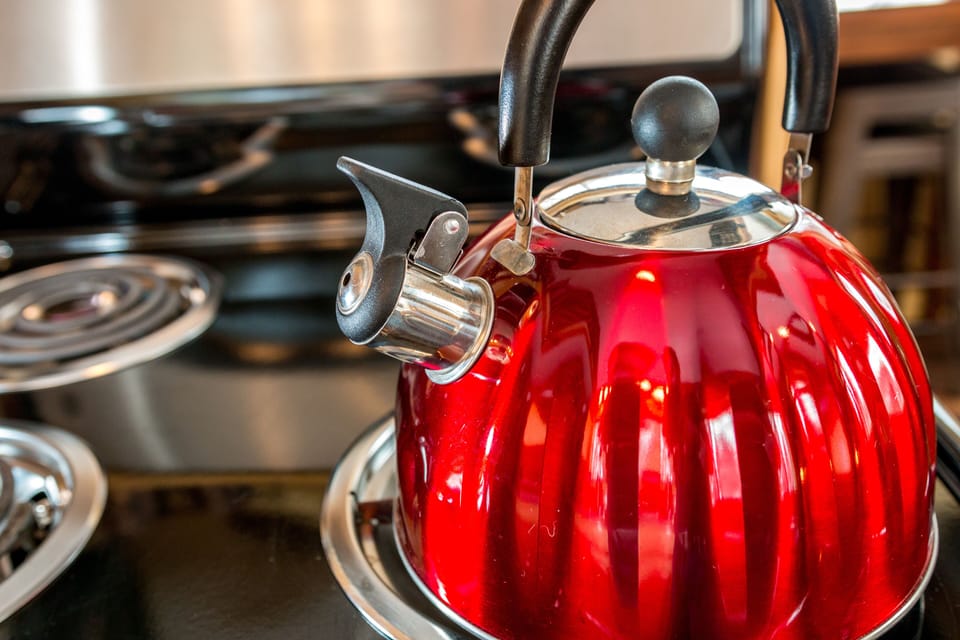 Tea pot and a small selection of teas provided.