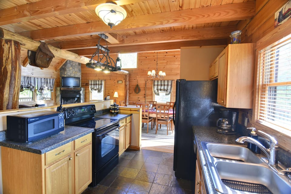 Kitchen is fully equipped to cook meals at the cabin.