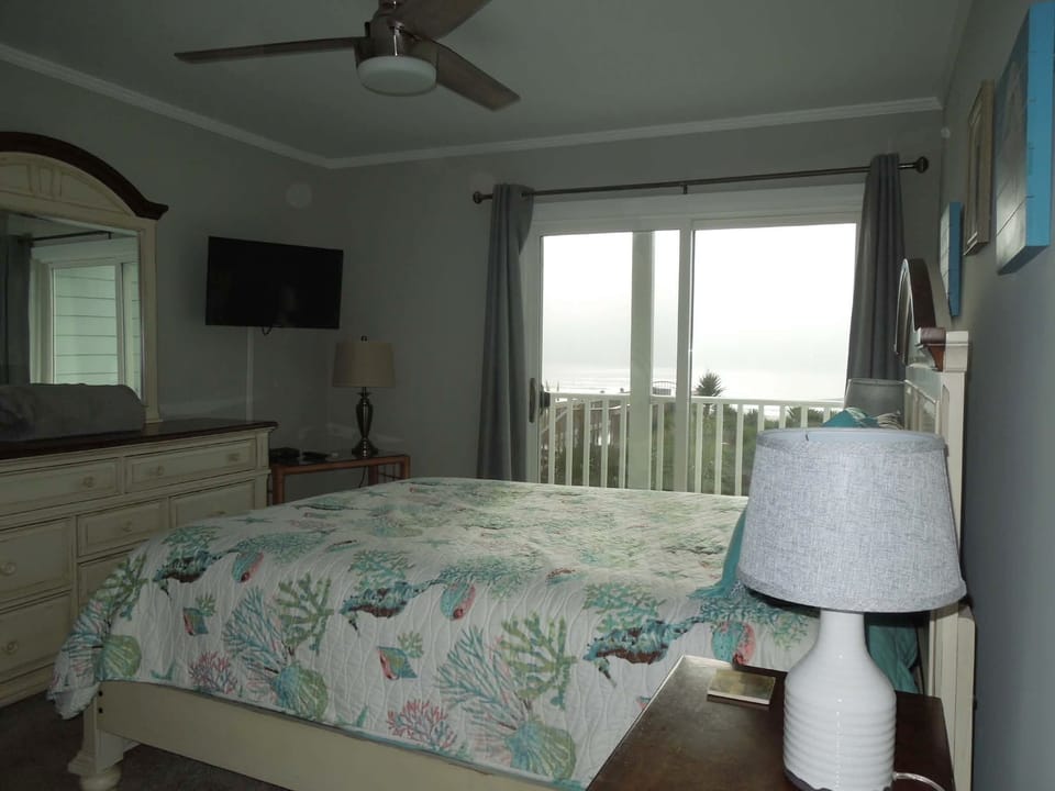 Peaceful master bedroom with coastal décor
