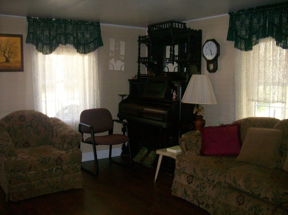 living room with grandmas old organ, she played.