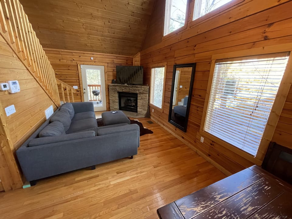 Living room view on entry. Gas fireplace. DirecTV & WiFi here, just like home! 