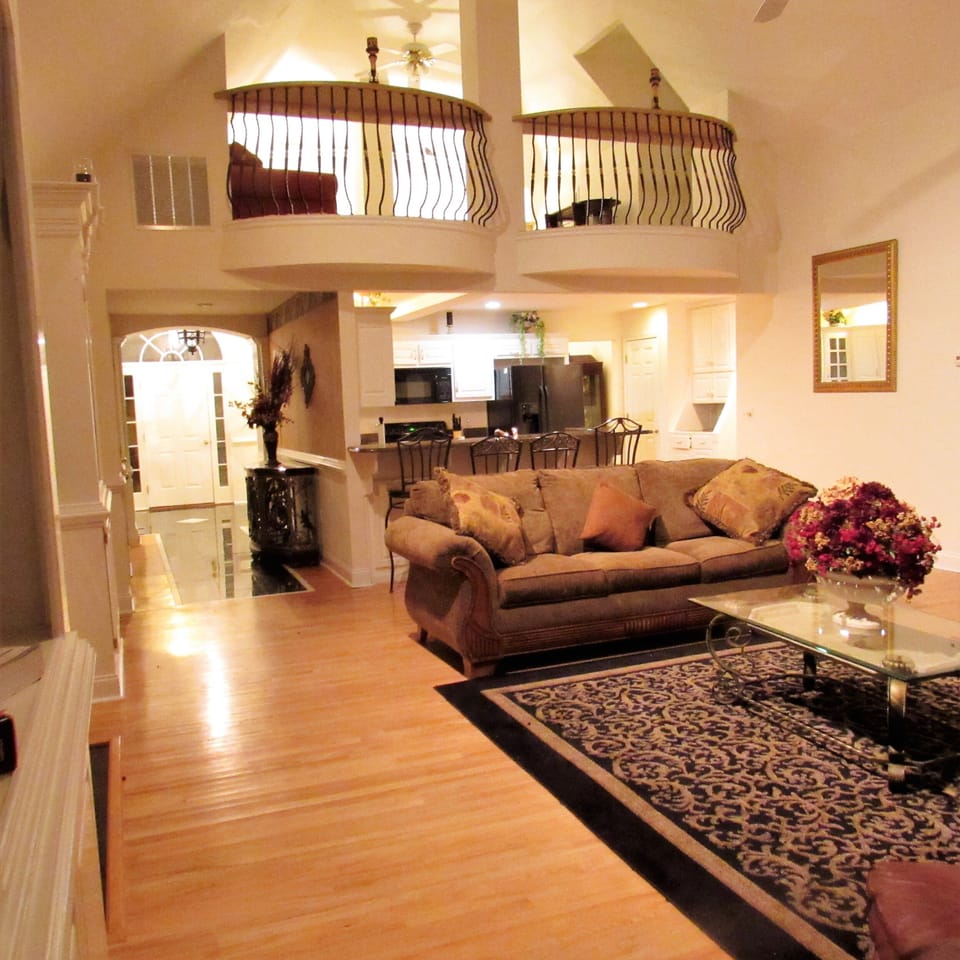 loft that overlooks the living room with magnificent views of the lake