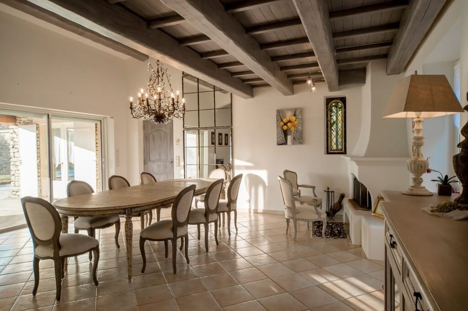 Living room, dining room with access to the terrace and kitchen