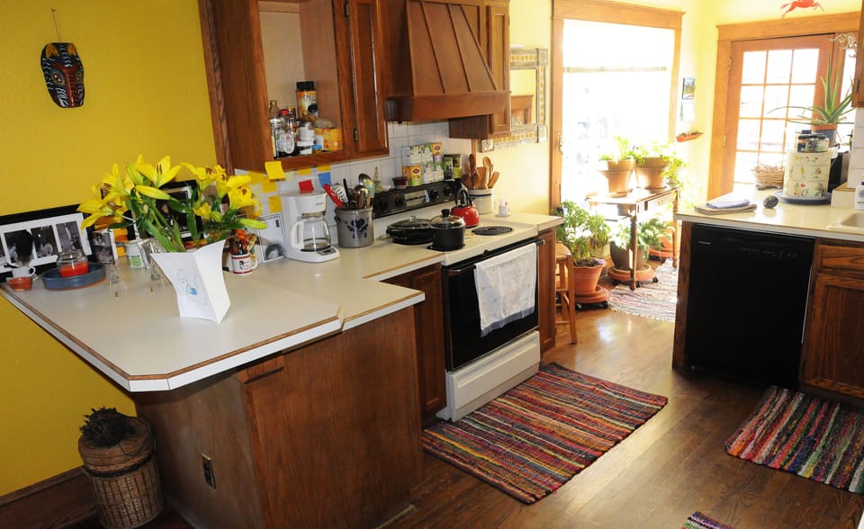 Full kitchen has everything you would want. Nice access to large deck with grill