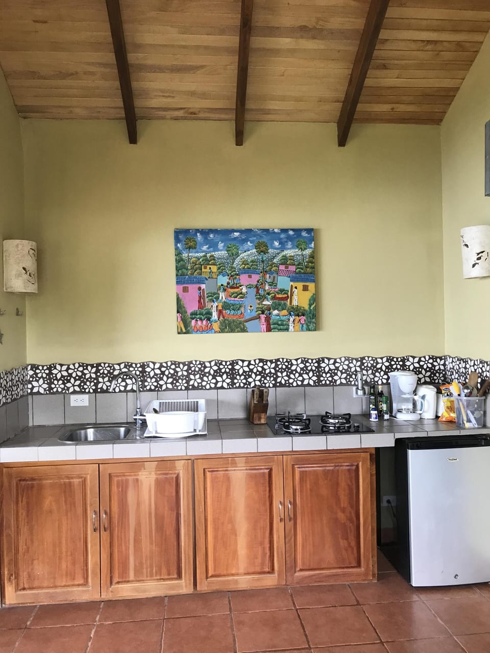 Kitchenette with propane cooktop, refrigerator, all utensils and dishes etc