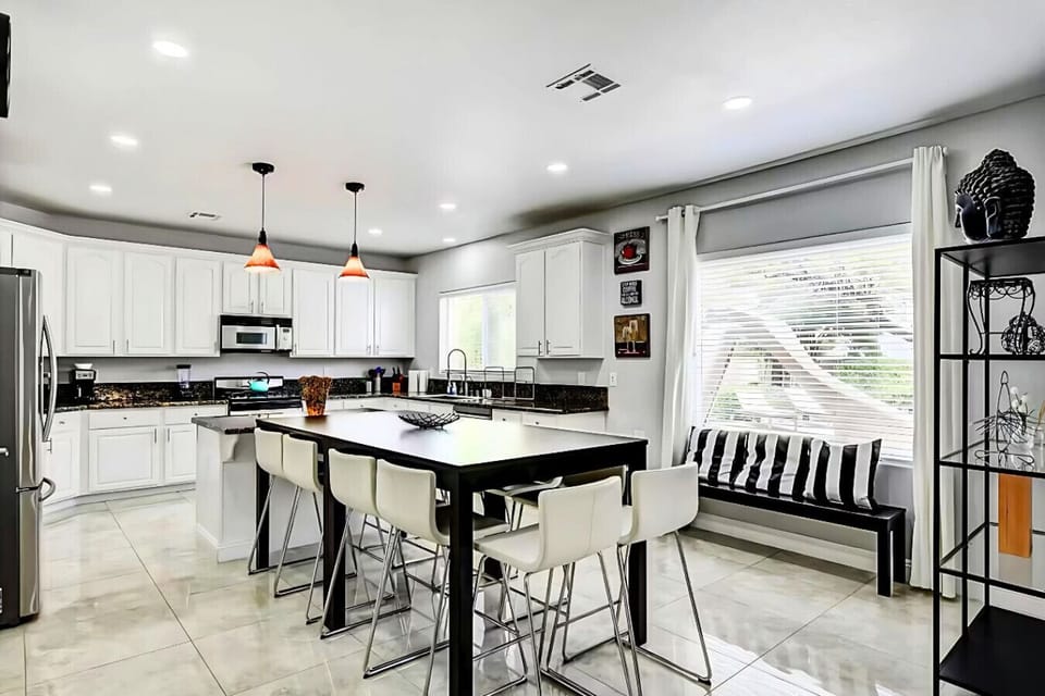 A chef’s dream kitchen, fully equipped with ample space to cook, prep, and gather. Perfect for creating delicious meals and lasting memories together.