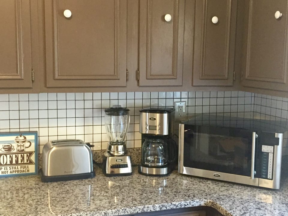 Toaster, blender, coffee maker, and microwave all ready for you!