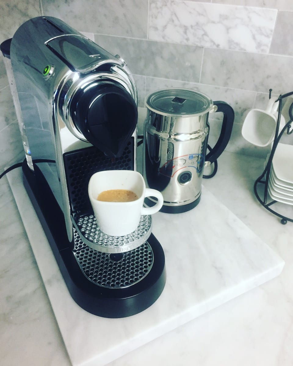 Nespresso; espresso, latte, reg. drip coffee & Starbucks coffee complimentary. 