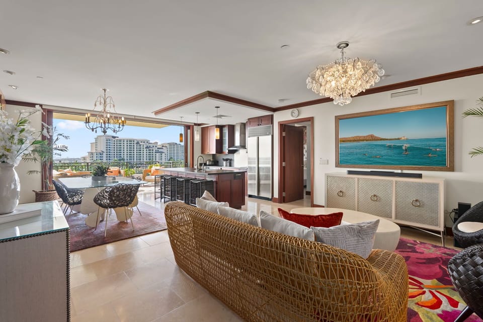 Shown with lanai doors fully open extending the living space