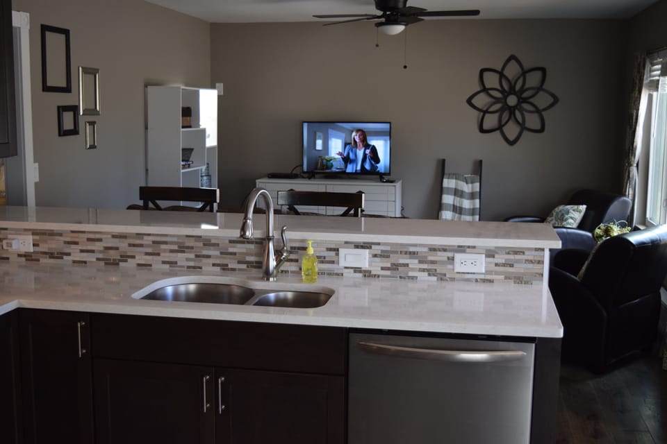 Kitchen looking into living room