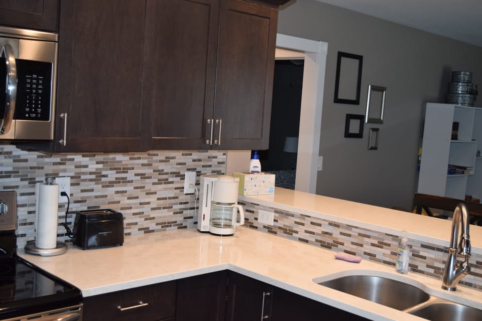 Kitchen with eat in island that seats 3