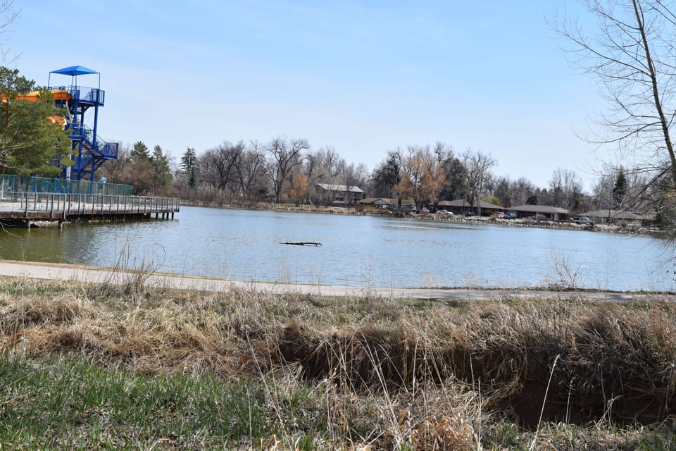 City park with bike paths around the lake and the outdoor water park.
