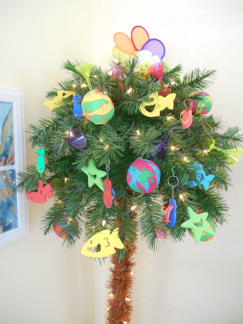 Fun palm tree is decorated year round.