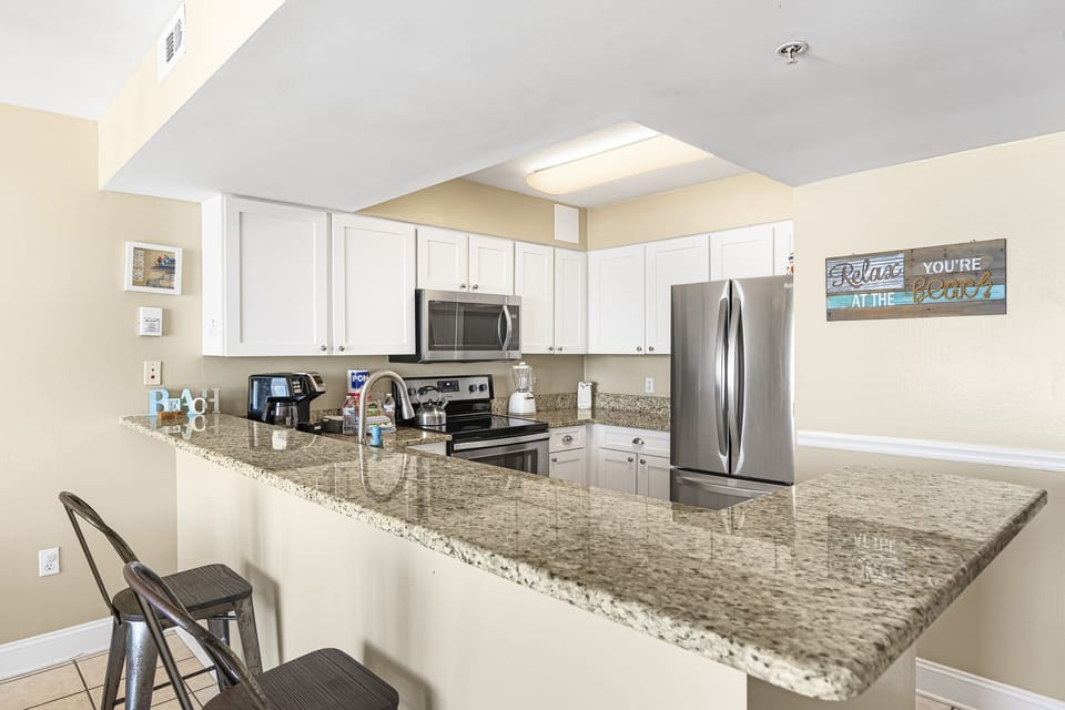 Full kitchen with stainless appliances