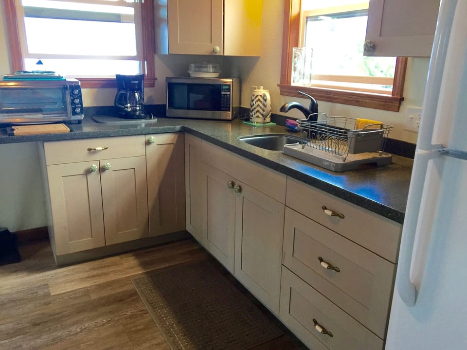Fully equipped with large tabletop convection/toaster oven, microwave, etc.