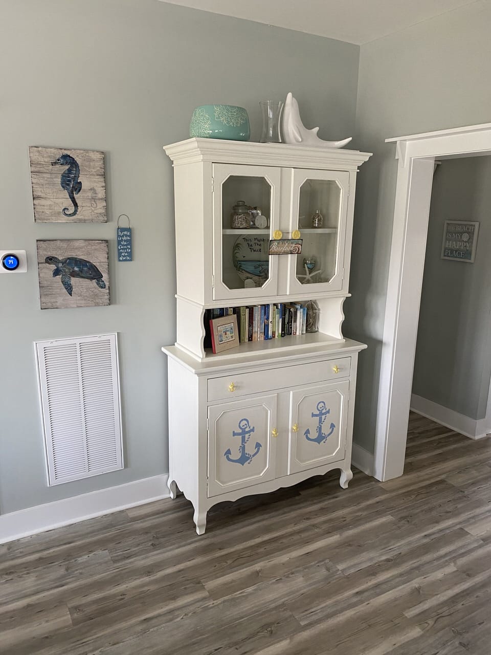 Game cabinet with books, puzzles, board games, cards